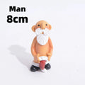 Naughty Mr & Mrs Claus Ornaments